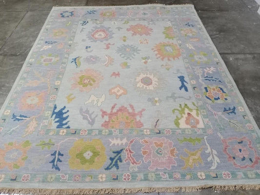 Milagro Flash Sale No. 057 — Pale blue with pastel floral motifs, horizontal photograph