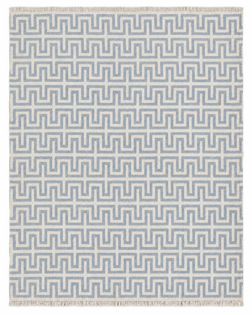 Miramar Two Hues rug in pale blue and ivory with natural wool fringe